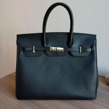 하마노 블랙 가죽 핸드백 프론트 락 포함