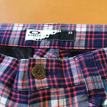 오클리 스컬 골프 체크 팬츠 33