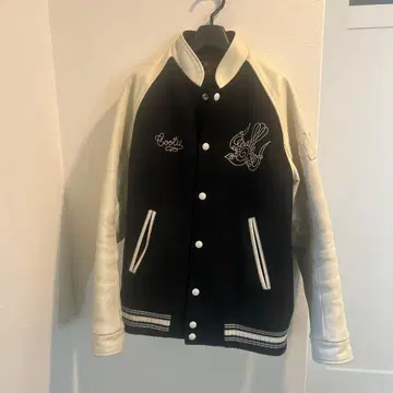 COOTIE x TRIBE 트라이브 절개 바시티 자켓