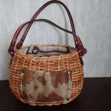 Cachellie 등나무와 가죽 바스켓백