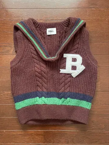 Bibiy. 케이블 짜임 슬리브리스 스웨터