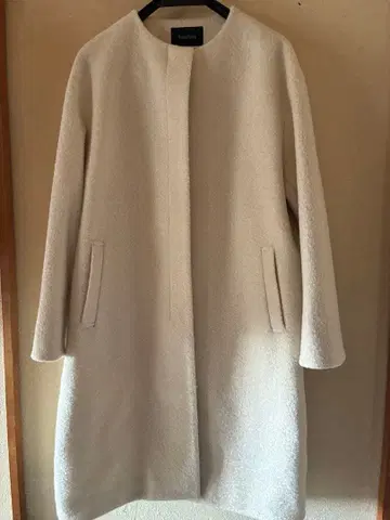 크림색 노카라 코트 플리스 소재