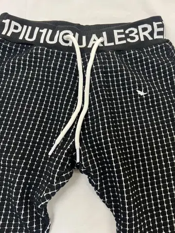 1PIU1UGUALE3RE 체크 무늬 조거 팬츠