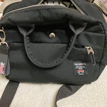 LISA LARSON 블랙 숄더백