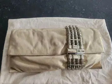 Jimmy Choo 골드 클러치백