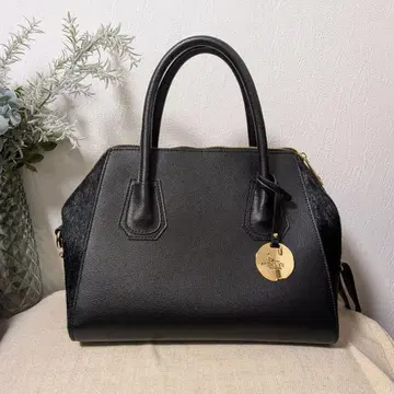 BEVNI 이소재 가죽 백