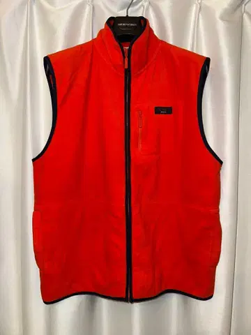 TOMMY JEANS 오렌지 플리스 베스트