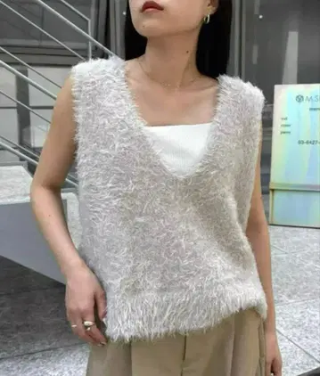 믹스 페더 얀 크롭 기장 베스트