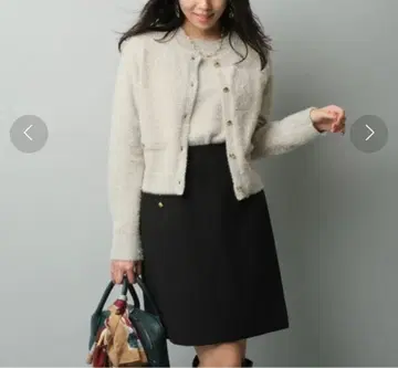 저스길리티 전개 버튼 디테일 스커트 S 사이즈