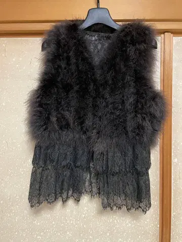 퍼 베스트 깃털 마라보