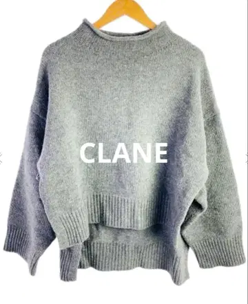 CLANE 사이드 슬릿 와이드 케이프 니트