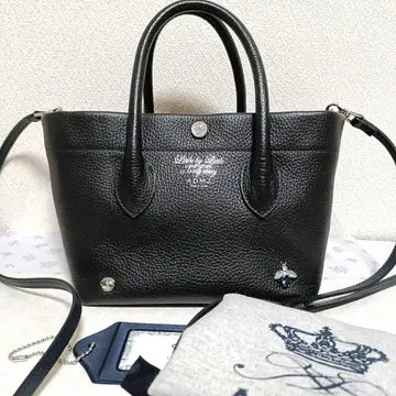 새상품급 ADMJ THE BEE 소프트 슈링크 엠보 큐브 미니 토트백