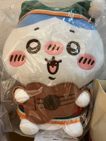 기타를 든 봉제 인형