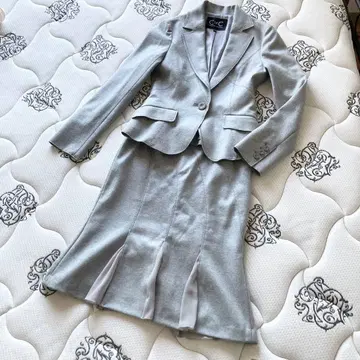 쿠 드 샹스 수트 셋업 테일러드 플레어 스커트 울 38