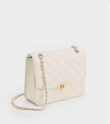 찰스앤키스 퀼티드 푸시락 클러치백 (크림)