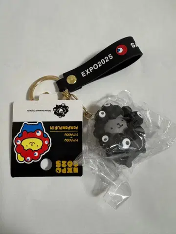 오사카 만박 폼폼푸딩 블랙 미야쿠 스트랩 EXPO2025