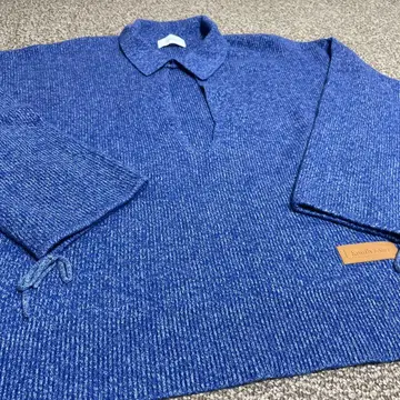 Knuth Marf slit neck loose knit blue