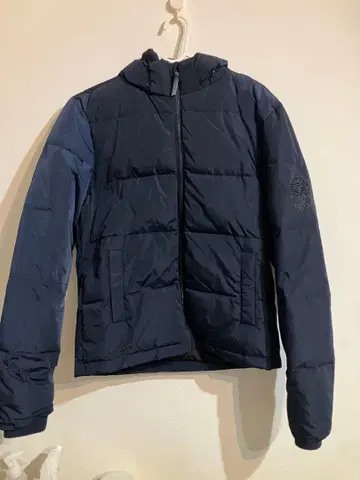 네이비 다운 자켓 후드 부착 스컬 디자인