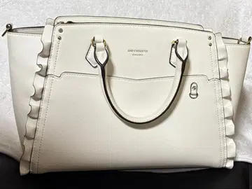 AND CHOUETTE 화이트 프릴 토트백 이타백