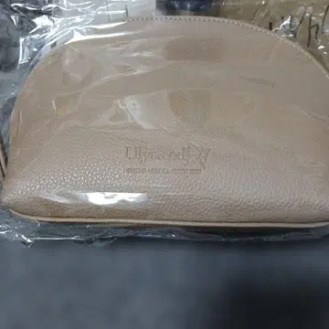 베이지 합성 피혁 라운드형 파우치