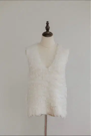 pois 포와 니트 베스트