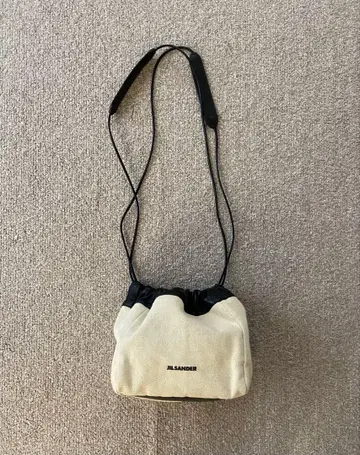 JIL SANDAR 질 샌더 드로우 스트링 크로스 바디백