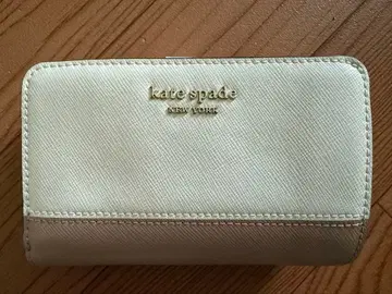 케이트 스페이드 접이식 지갑 크림색