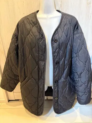 노치. 블랙 퀼팅 자켓