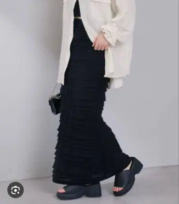 Kastane 프릴 블랙 스커트