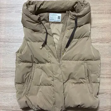 새상품급 PASSIONE 베이지 다운 베스트