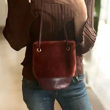 마르코 마시 퍼와 가죽 숄더백 무스탕 백