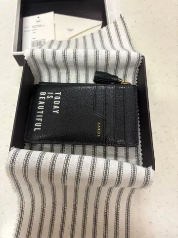 ANYA HINDMARCH 론 헤르만 별주 카드 케이스