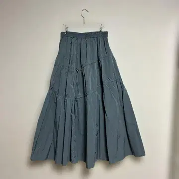 JEANASIS 드로스트 셔링 플레어 스커트