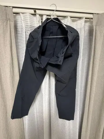 네이비 슬랙스 폴리에스테르 앵클 팬츠