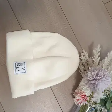 크림색 접이식 니트 모자