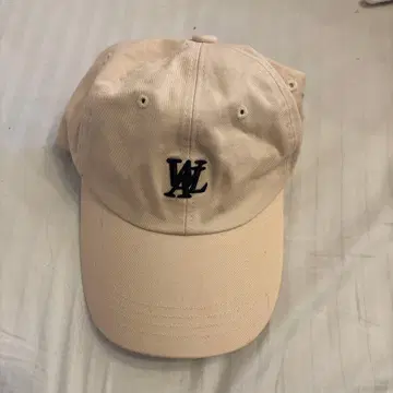 WOOALONG 우알롱 캡 베이지 자수 로고