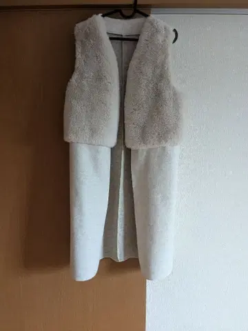 크림색 슬리브리스 롱 베스트