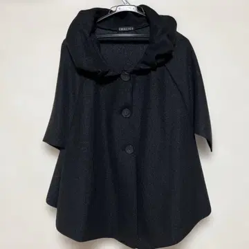 T W A L I C E의 블랙 판초