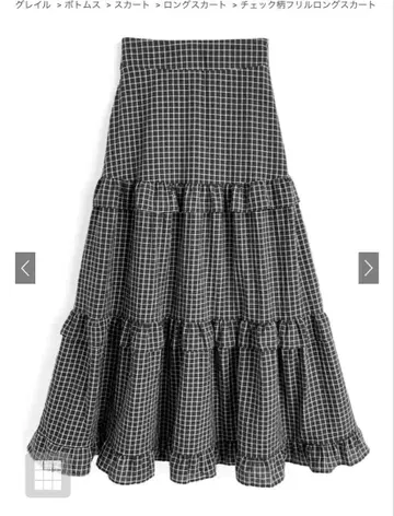 체크 무늬 티어드 플레어 스커트