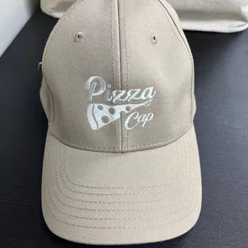 니시오 카즈오와 피자를 둘러싼 모임의 피자 캡