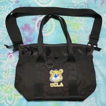 [ NEW ERA ] UCLA 스크립트 로고 미니 토트백 블랙 6L
