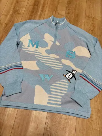 먼싱웨어 하프 지퍼 스웨터