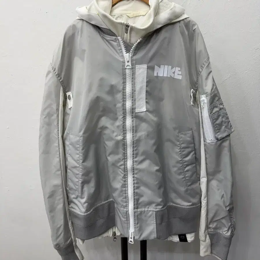 Nike x Sacai NRG Bomber Layered Jacket on Bunjang Global Site.
