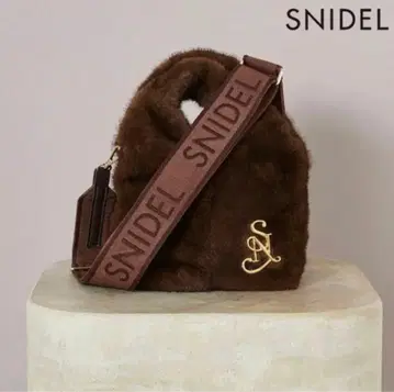 스나이델 퍼 백 브라운