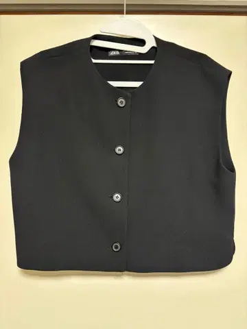 블랙 슬리브리스 베스트 L 사이즈