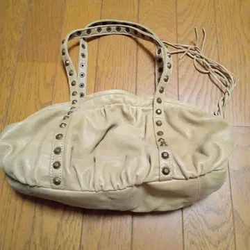 tsumori chisato 스터드 부착 핸드백