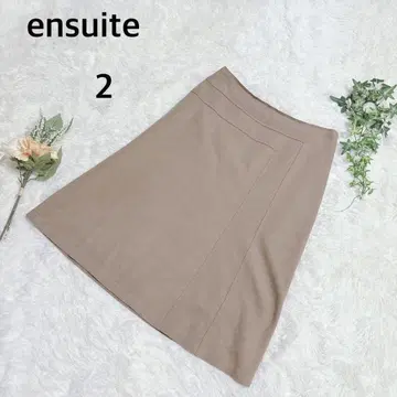 엔스위트 무릎 기장 스커트 베이지 사다리꼴 사이드 지퍼 레나운