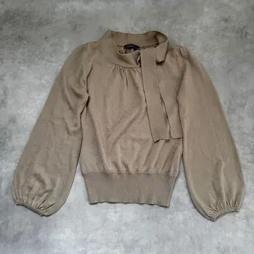 SCHEREL 베이지 리본 포함 니트 스웨터