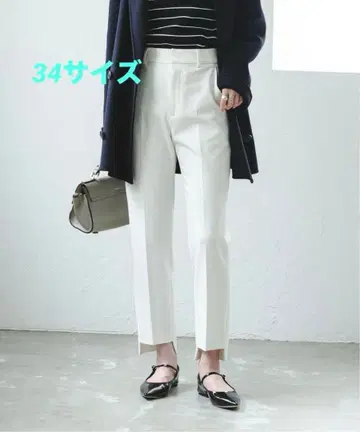 노블 캐럿 실루엣 스텝 헴 팬츠 34 화이트