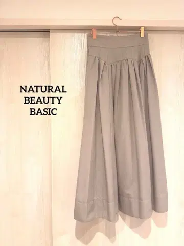 내추럴 뷰티 베이직 빅 리본 플레어 스커트